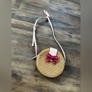 Juicy Couture Round Straw Crossbody Bag with a Pink Bow and Strap